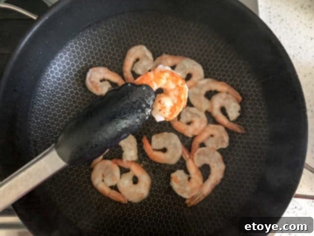 Shrimp Teriyaki Recipe stir fry shrimp Shrimp Teriyaki Recipe showing caramelized shrimp after 30 seconds