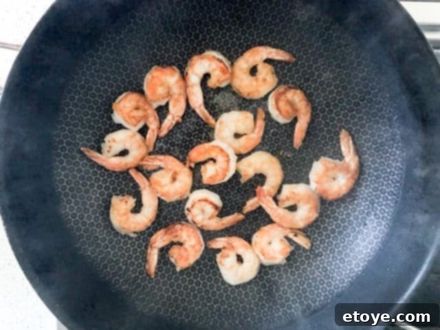 Shrimp Teriyaki Recipe stir fry shrimp Shrimp Teriyaki Recipe flipping shrimp to caramelize the second side