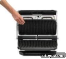 T-Fal OptiGrill's removable plates and grease tray