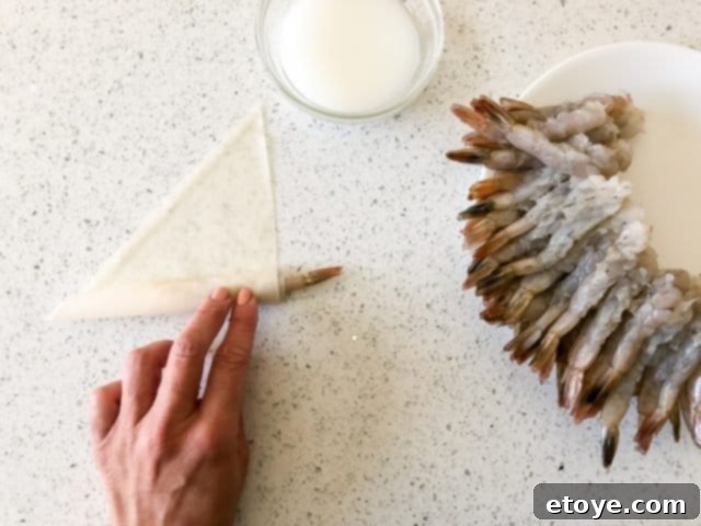 folding wrappers on table