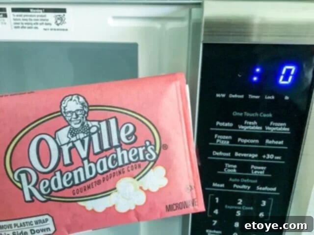 Control panel of Sharp Orville Redenbacher Microwave Oven with various functions