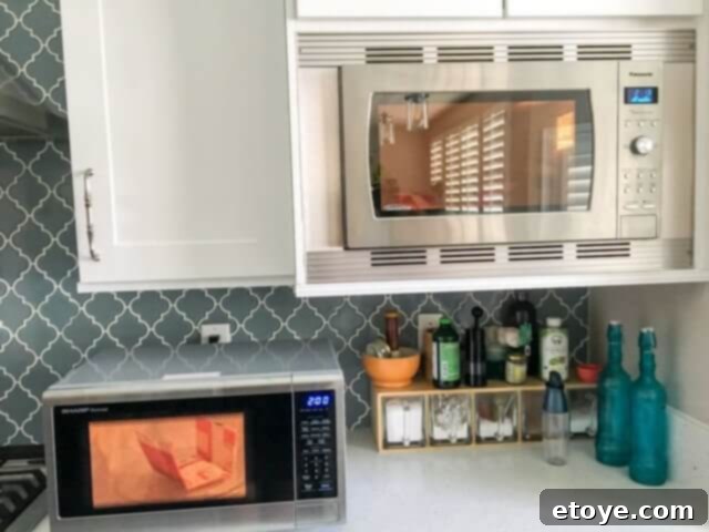 Inside view of a microwave oven as popcorn begins to pop