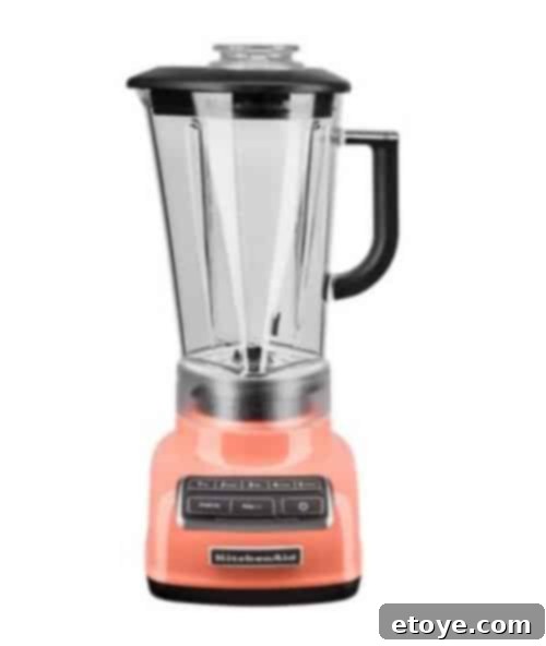 Elevate Your Kitchen Win a KitchenAid Blender 3 Close-up of the KitchenAid 5-Speed Diamond Blender in Bird of Paradise, highlighting its sleek design and rich color.