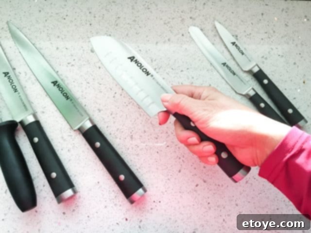Anolon 17-Piece Japanese Knife Set Review Plus a Chance to Win 3 Anolon 17-Piece Japanese Santoku Knife chopping vegetables
