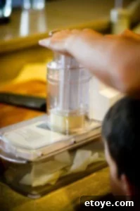 Child Fascinated by Mandoline Slicer for Potato Dominoes