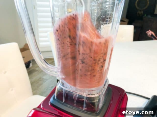 Cusibox 68oz Professional Blender Review & Giveaway 10 Cusibox Blender operating at high speed, blending frozen fruit