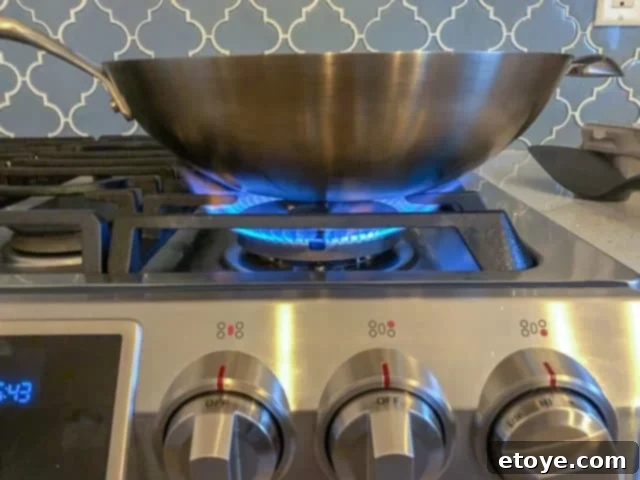 Scanpan CS+ Wok Review: Optimal shape and flat base for modern stovetops