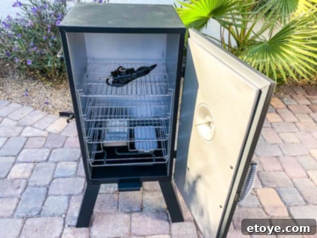 Cuisinart Vertical Electric Smoker Full Review Plus Giveaway 3 Man assembling the Cuisinart Vertical Electric Smoker