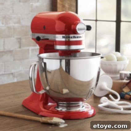 Win a KitchenAid Artisan 5-Quart Stand Mixer 2 KitchenAid Artisan Stand Mixer in action, mixing ingredients in its 5-quart bowl