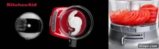 KitchenAid 7-Cup Food Processor with its various accessories neatly arranged, including the work bowl, lid, slicing, and shredding discs.