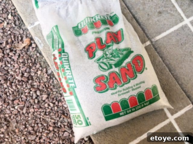 Simply Shade 11-ft Auto-Tilt Umbrella Review and Lowes Giveaway 4 Filling the umbrella base with sand