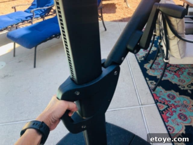 Simply Shade 11-ft Auto-Tilt Umbrella Review and Lowes Giveaway 7 Adjusting umbrella tilt with one hand