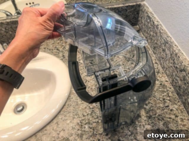 Bissell SpotClean Pro Tested Our Thoughts And Your Chance To Win 10 Disposing dirty water from SpotClean Pro