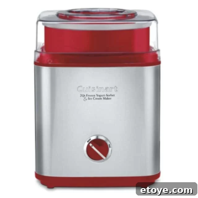 Closeup of the Cuisinart Pure Indulgence Ice Cream Maker's lid and ingredient spout, highlighting its ease of use.