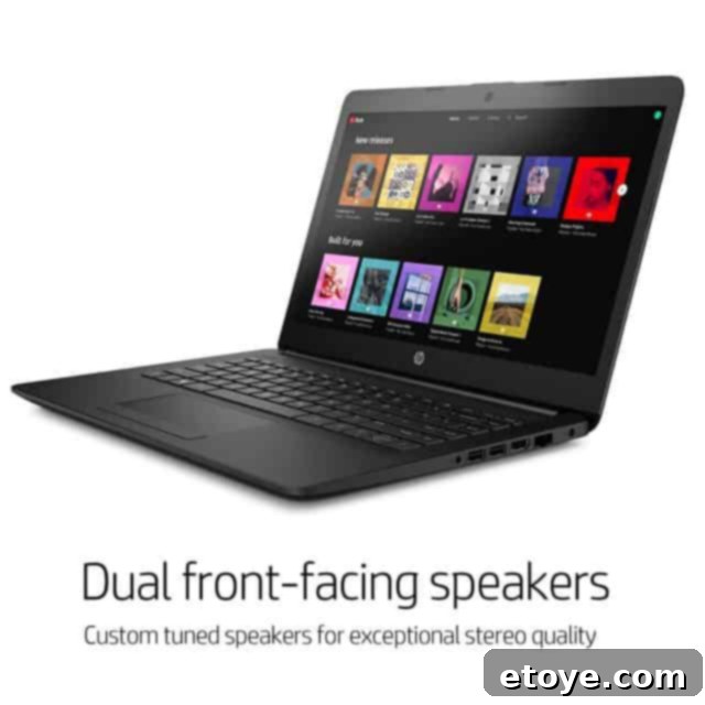 Score a Free HP 14-Inch Laptop 3 HP 14-inch laptop keyboard and trackpad, highlighting its ergonomic design.