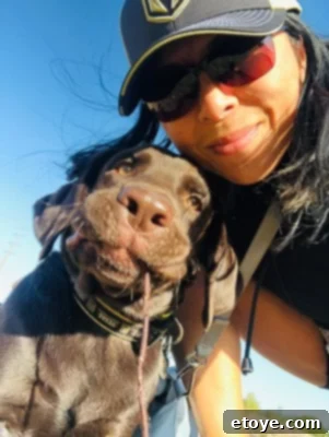 Win 500 Dollars This Holiday 3 Author Jaden and her beloved dog Duke enjoying a beautiful, sunny day at the park.