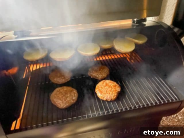 Burgers cooking on Z Grills 700E