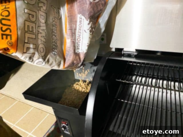 Filling the Z Grills 700E hopper