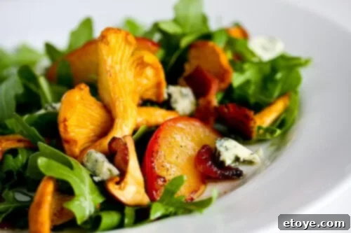 chanterelle-bacon-blue-cheese-plum-salad-88 Chanterelle, Bacon, Blue Cheese, Plum Salad presented beautifully on a plate