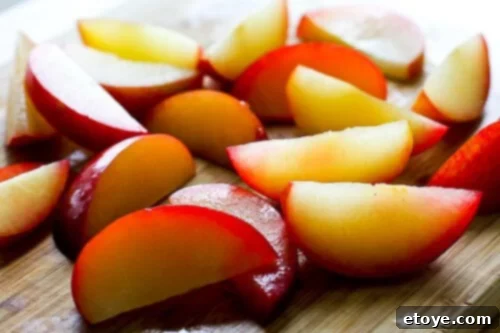 chanterelle-bacon-blue-cheese-plum-salad-49 All plum wedges neatly arranged after being cut, showcasing the successful technique