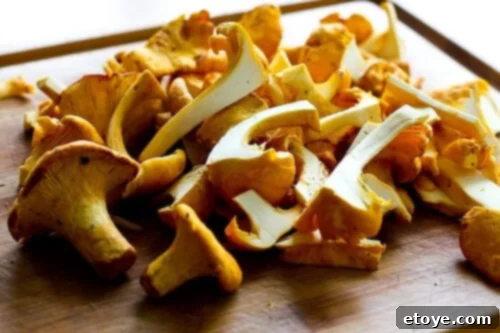 chanterelle-bacon-blue-cheese-plum-salad-34 Chanterelle mushrooms gently sautéing in a pan with bacon drippings