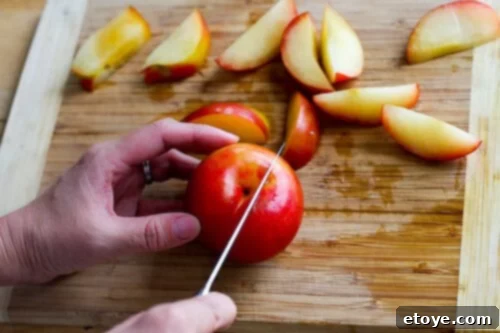 chanterelle-bacon-blue-cheese-plum-salad-39 Illustrating the first cut on a plum, parallel to its natural seam