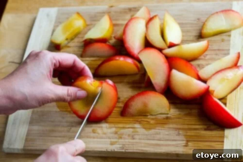 chanterelle-bacon-blue-cheese-plum-salad-47 Last step: angling the knife to cut the remaining flesh from around the plum pit