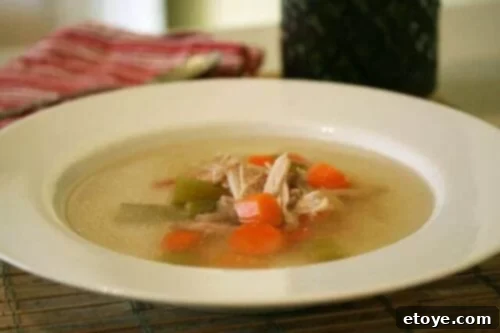 Unforgettable Chicken Creations 7 Soup served in a white bowl