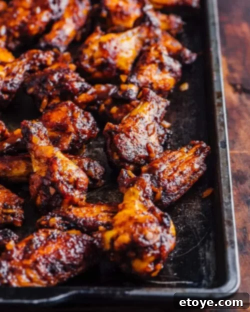Unforgettable Chicken Creations 9 BBQ wings on a baking sheet