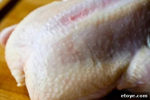 Hainanese Chicken Rice Recipe - Step by step photos Close-up of clean chicken skin after exfoliation