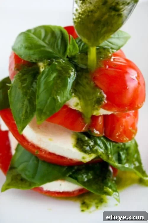 Caprese Salad with Homemade Basil Vinaigrette Caprese Salad Recipe: Fresh Tomatoes, Mozzarella & Basil Vinaigrette