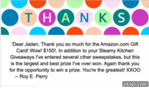 Kitchen Revelations 5 Smiling winner holding up a giveaway prize with enthusiasm, ready to enjoy their reward.