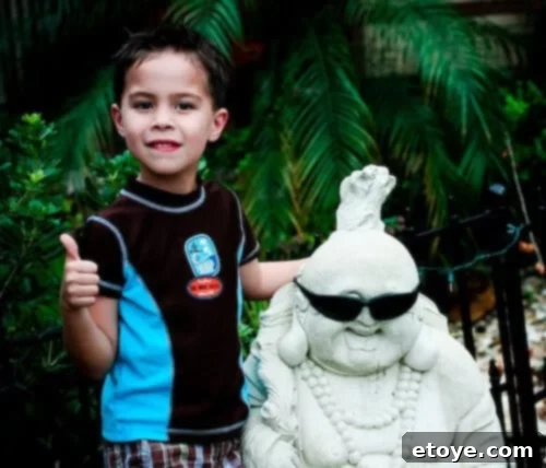 Buddha statue with rock on hand gesture, symbolizing good vibes in Mount Dora