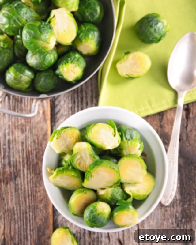 Close-up of freshly steamed Brussels sprouts, seasoned and ready to eat