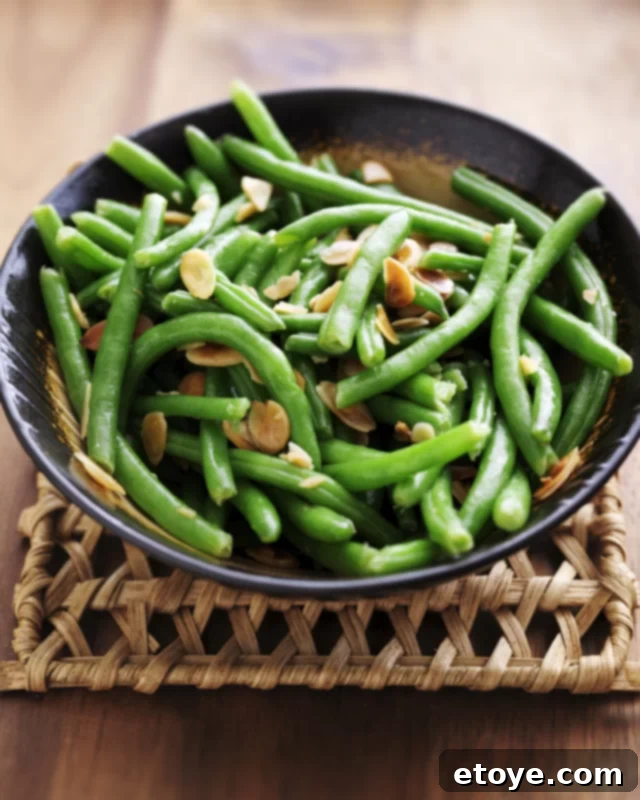 The Easiest Microwave Steamed Green Beans 2 Fresh green beans in a microwave-safe bowl