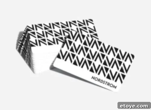 Win a Nordstrom Gift Card Instantly 3 A person happily holding Nordstrom shopping bags