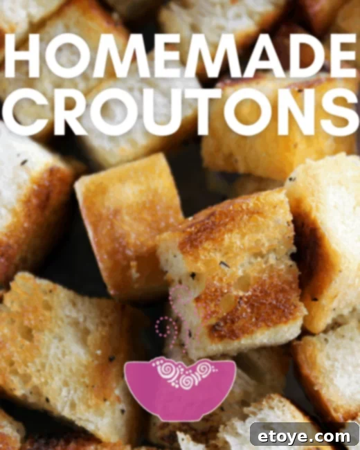 Crispy Homemade Croutons 2 Homemade croutons scattered over a fresh salad or Buddha bowl, highlighting their golden-brown crispness.