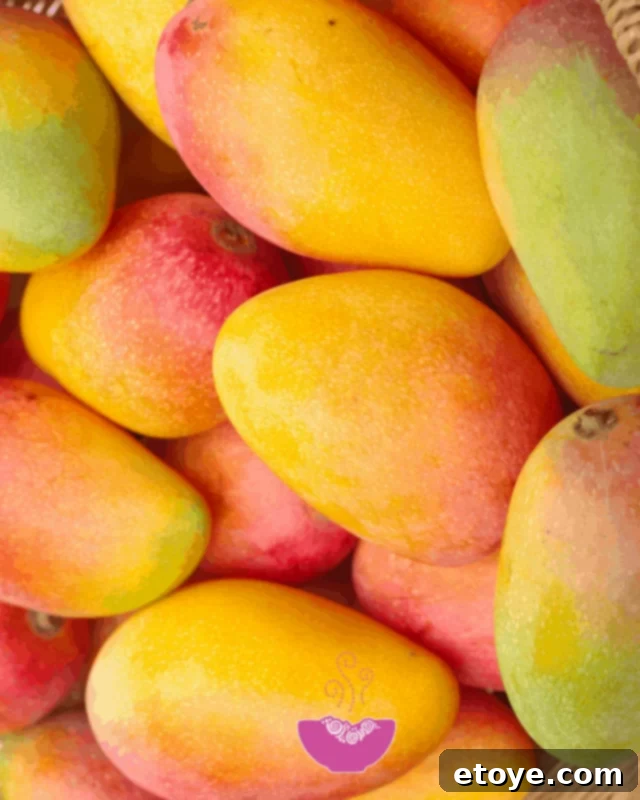 A perfectly cut mango, ready to be added to a Buddha Bowl.
