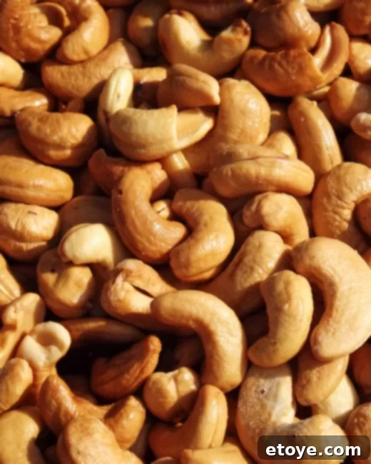 Microwave toasted nuts on a plate, ready to be enjoyed.