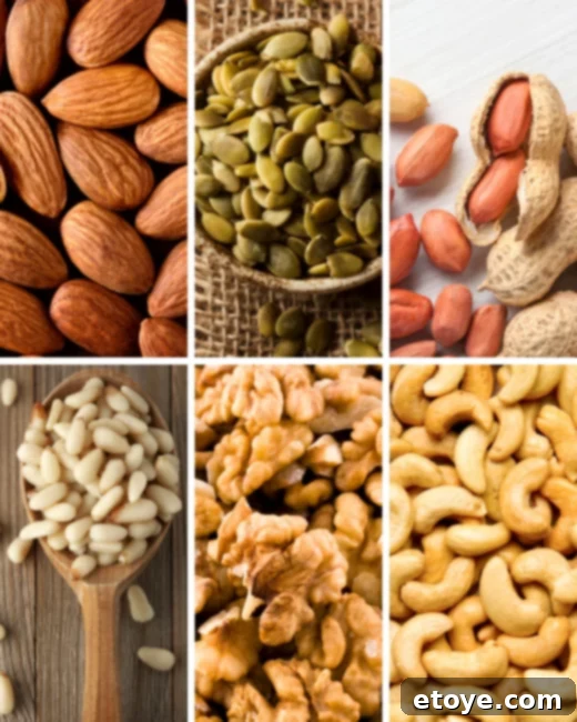 Close-up of toasted walnuts and almonds on a plate.