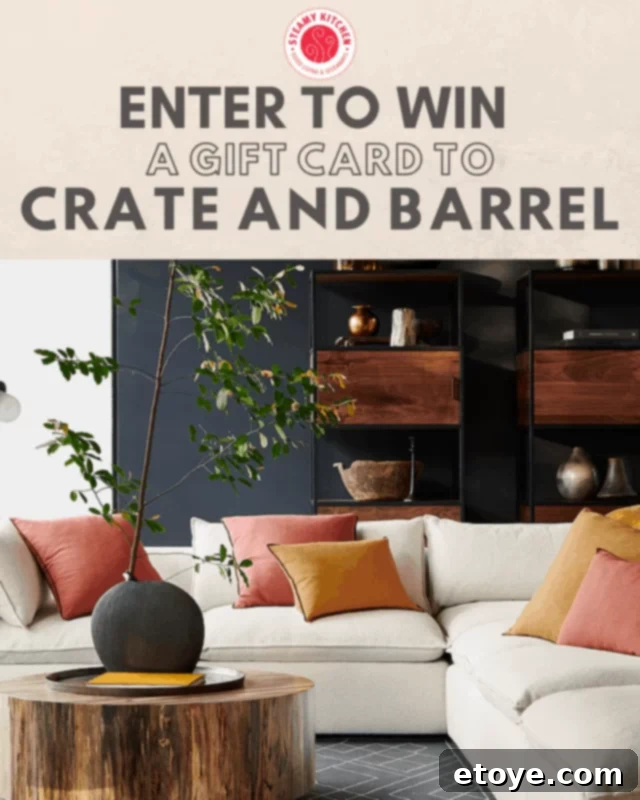 Win a Crate and Barrel 100 Gift Card 2 Elegant living room decorated with Crate and Barrel furniture, stylish throw pillows, and modern accents, showcasing a cozy and inviting atmosphere.