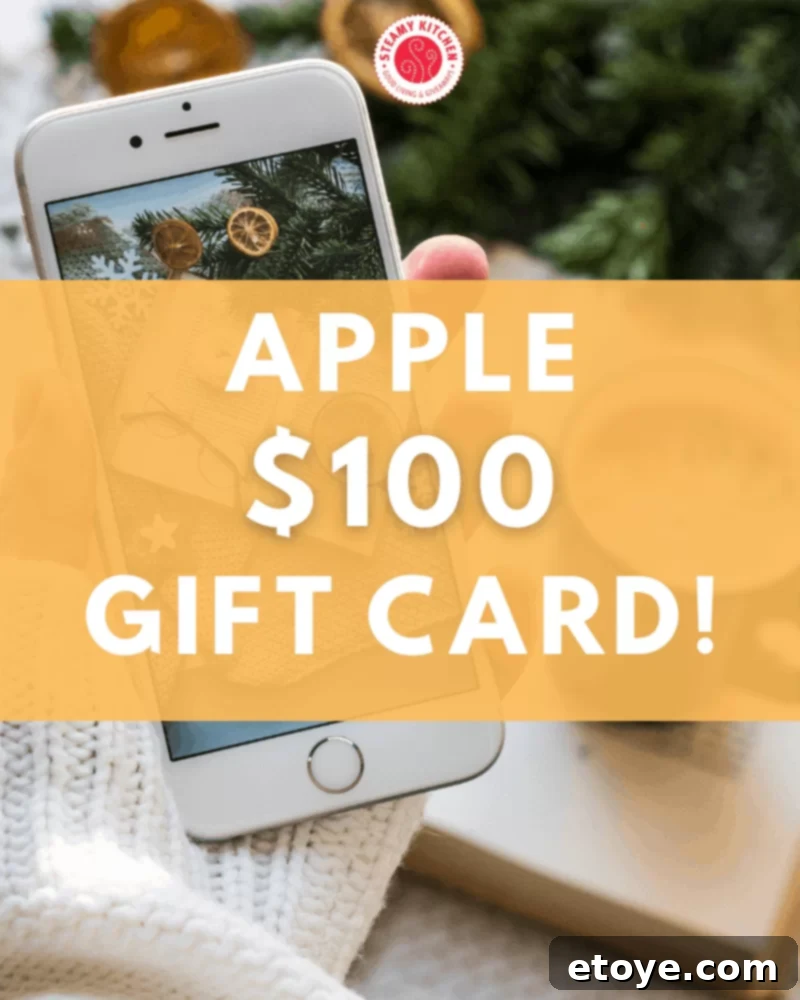 Win a 100 Apple Gift Card 2 Person holding an iPhone with a gift card overlay, symbolizing the $100 Apple Gift Card giveaway