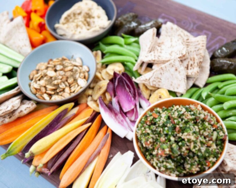 Crispy Pumpkin Seed Perfection 5 za'atar roasted pumpkin seeds and tabbouleh on a hummus board