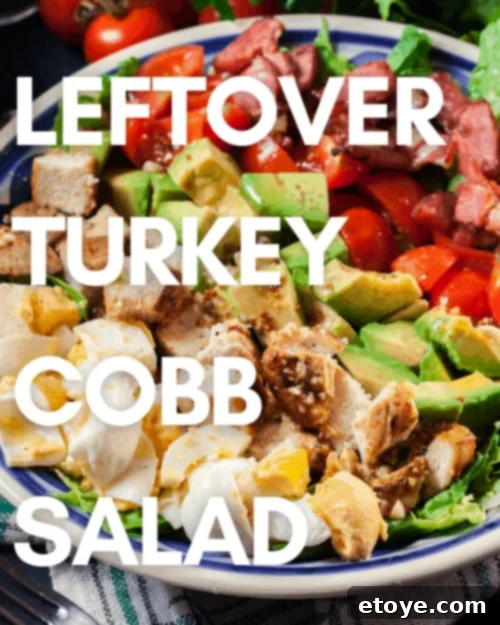 Delicious Leftover Turkey Cobb Salad served in a large bowl, showcasing fresh ingredients