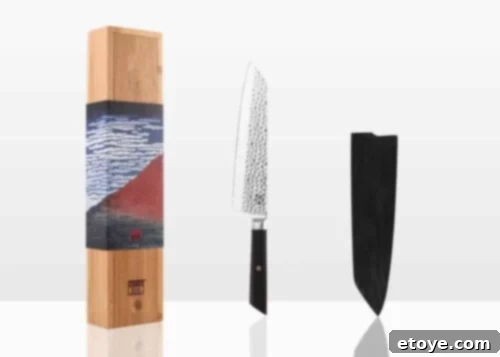 Stunning KOTAI Kiritsuke Chef Knife with a sleek black Pakkawood handle, striking red detailing, and a premium steel blade, showcasing its elegant design and craftsmanship.