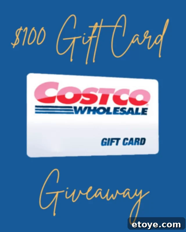 A diverse selection of bulk food products in a shopping cart at Costco, including fresh produce, packaged goods, and beverages, highlighting variety and value.