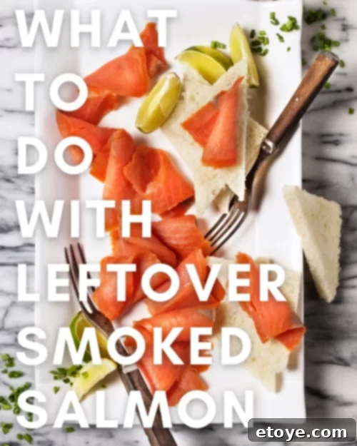 Reinventing Leftover Smoked Salmon 2 Smoked salmon slices on a white platter.