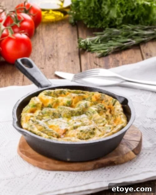 Reinventing Leftover Smoked Salmon 4 fritatta in a black cast iron pan on a wood cutting board.
