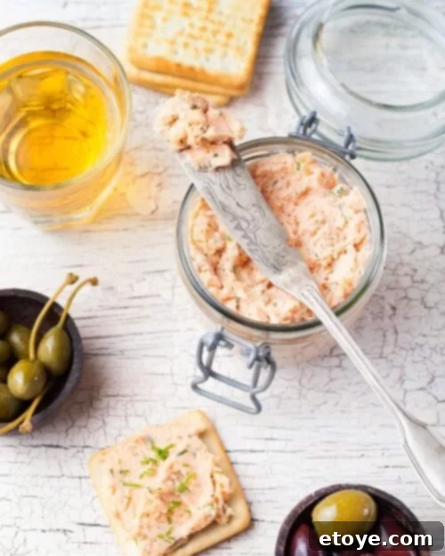 Reinventing Leftover Smoked Salmon 6 salmon paté in a jar with bread and olive sides.
