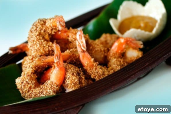 Crispy Sesame Shrimp with Honey Mustard Dip 3 Crispy Sesame Shrimp served with a side of honey mustard sauce